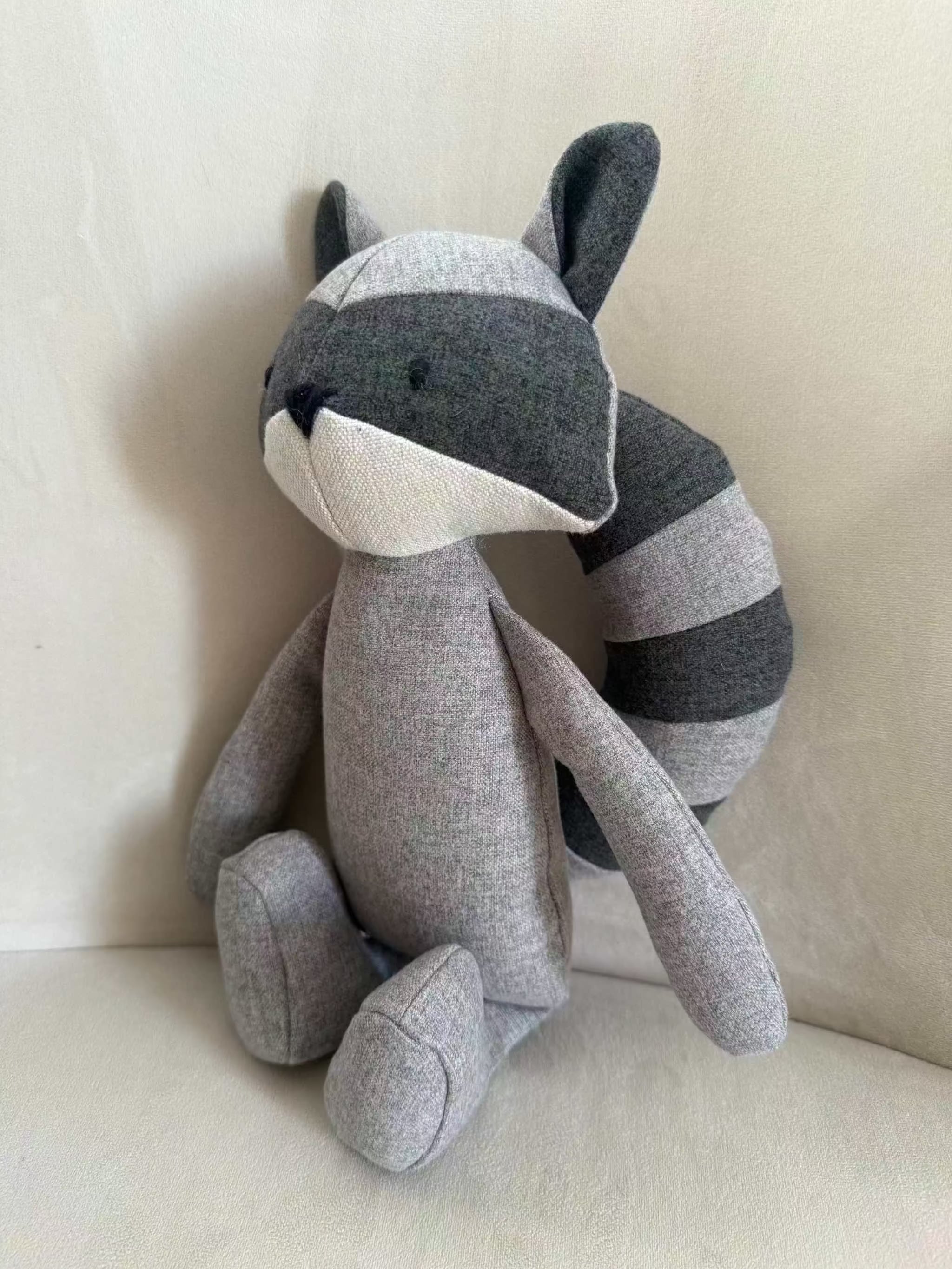 Cuddly toy Wil the Raccoon
